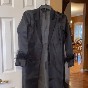 NBD black duster with fur sleeve.  Great for a swim cover up
